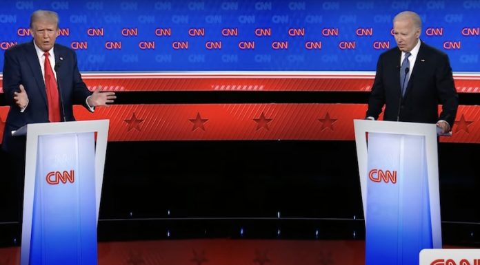 Mexico and immigration issues take center stage in US presidential debate U.S. President Biden and Trump debate issues like immigration, border security and more from behind podiums on a stage.