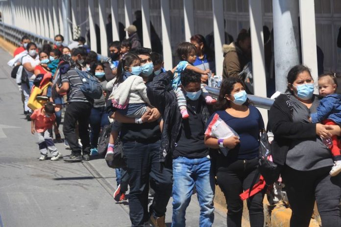 migrants deported across US border into Mexico