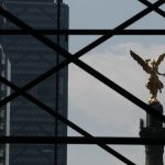 Mexico City's Angel of Independence appears behind scaffolding