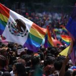 A flag flies at the 2024 Mexico City pride parade