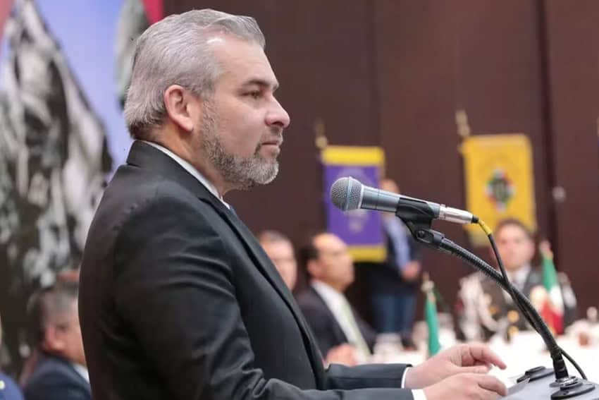 Michoacan Gov. Alfredo Ramirez Bedolla standing at a podium