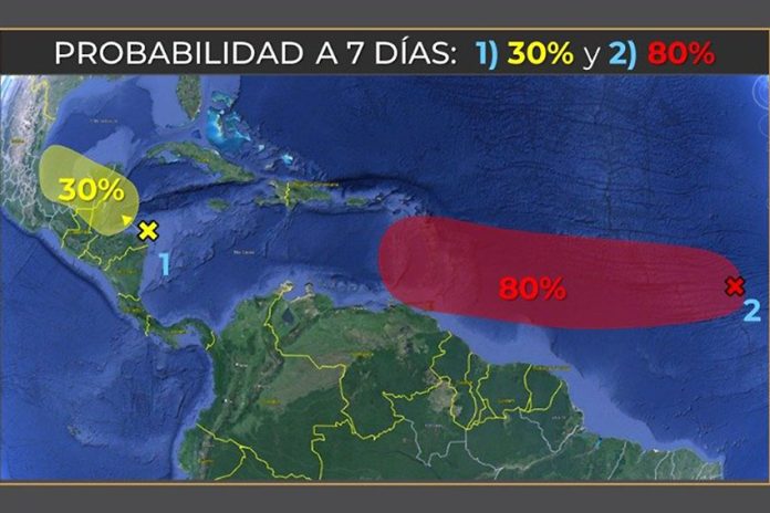 weather map of the Yucatan Peninsula showing two weather systems approaching land. One is labeled with a 30% chance of becoming a named storm in the next week, while the other is labeled at 80%