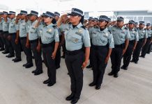 National Guard members salute during the inauguration of new facilities in Oaxaca on Sunday.