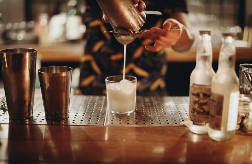 Bartender making cocktails