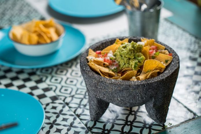 shutterstock_1536736616 Guacamole in a molcajete