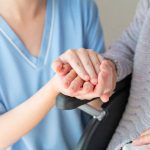 Young nurse with an elderly patient