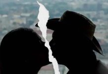 Couple kissing each other, but the photo is broken in half because they broke up